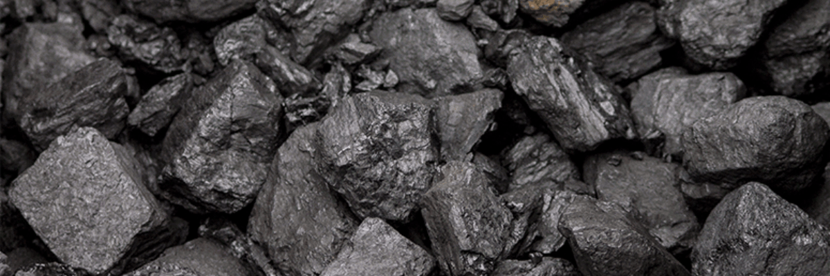 A pile of jagged coal briquettes.