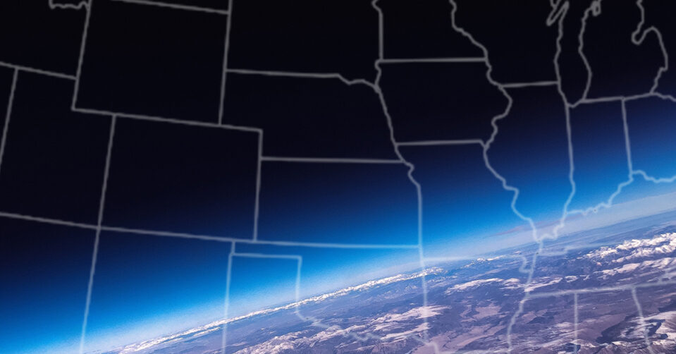 The outline of a map of U.S. states overlaid on partial view of the planet from space
