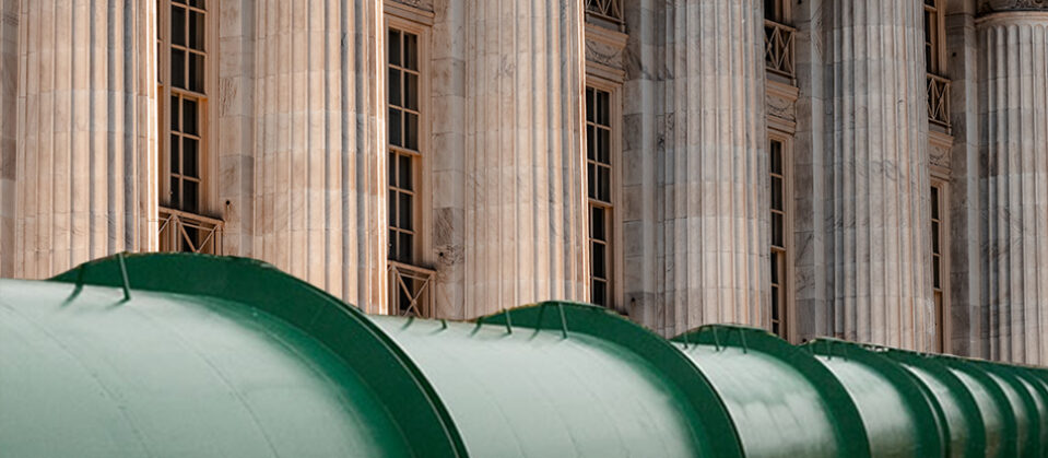 A pipeline in front of a court house.