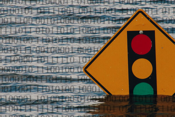 A traffic sign in a flood, transposed with binary code.