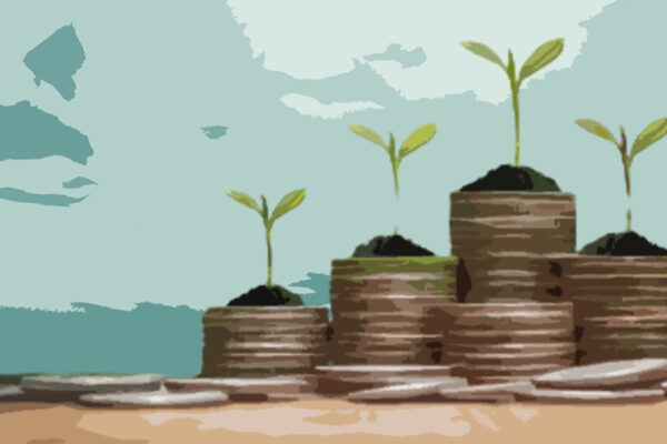 Stacks of coins with seedlings sprouting out of them