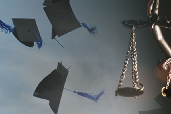 On the left, graduates through their caps into the air and hold diplomas. On the right, a bronze Lady Justice statue.