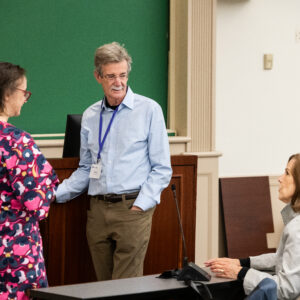 In a classroom, Professor Katrina Wyman speaks with Former Maryland AG Brian Frosh